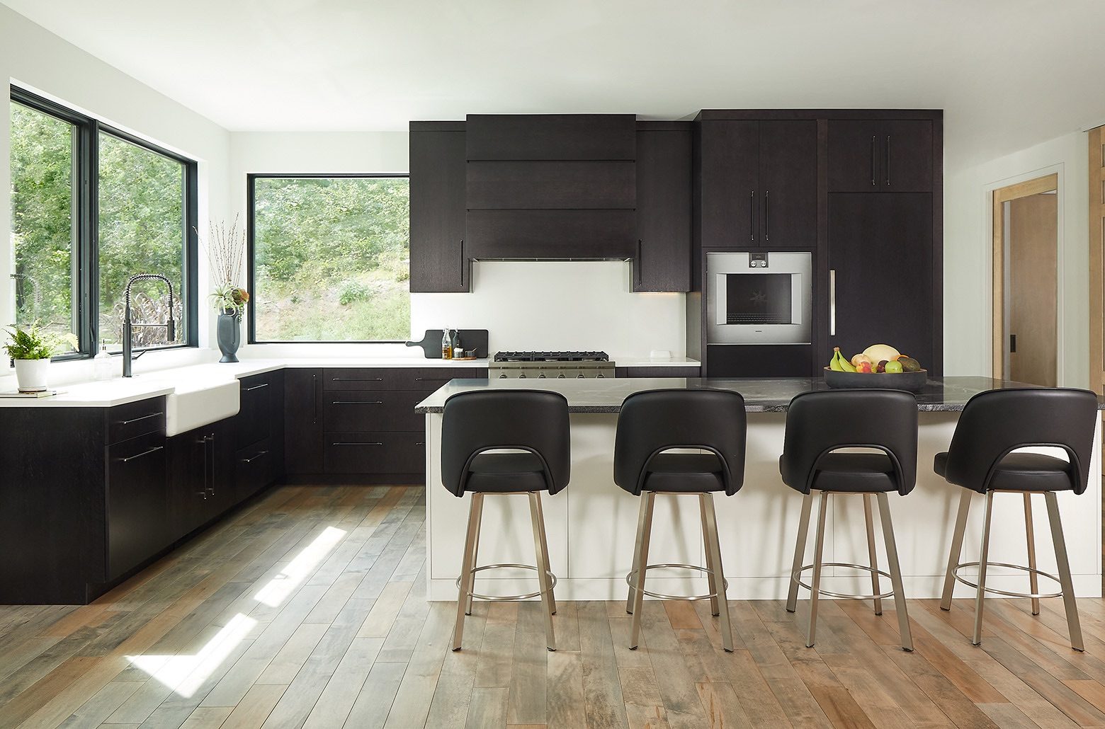 Black and white modern kitchen with bar style seating