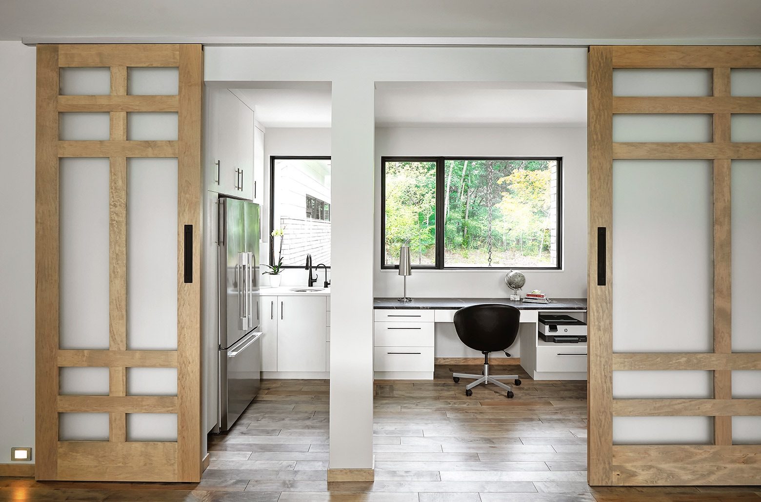 Office space with sliding wooden door