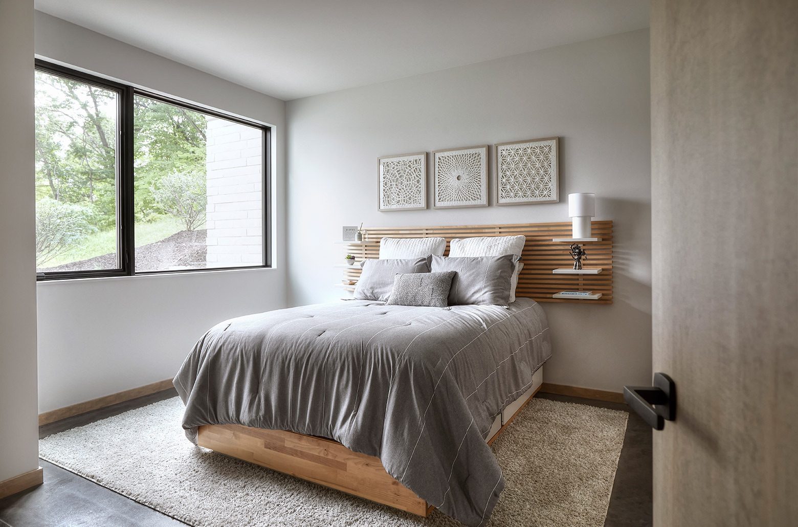 A calming bedroom with a view of nature