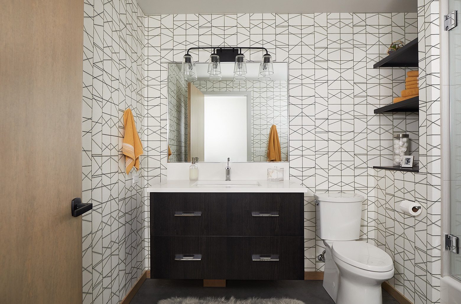 A contemporary bathroom with striking decorative tile