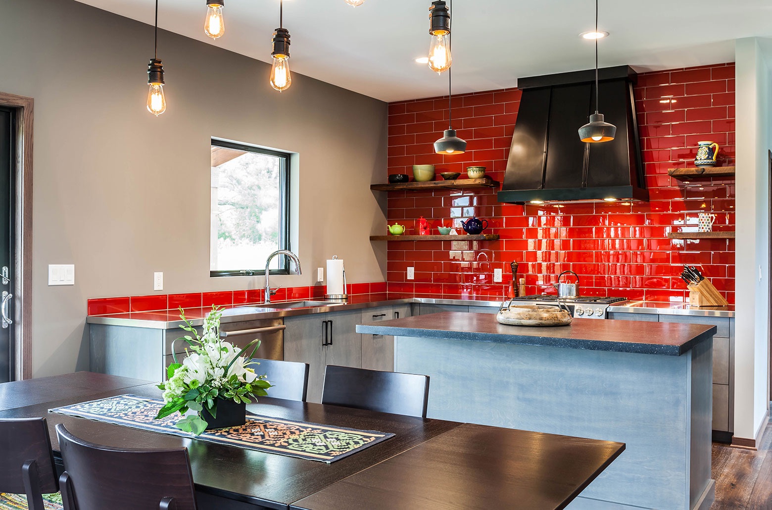 kitchen with red brick wall