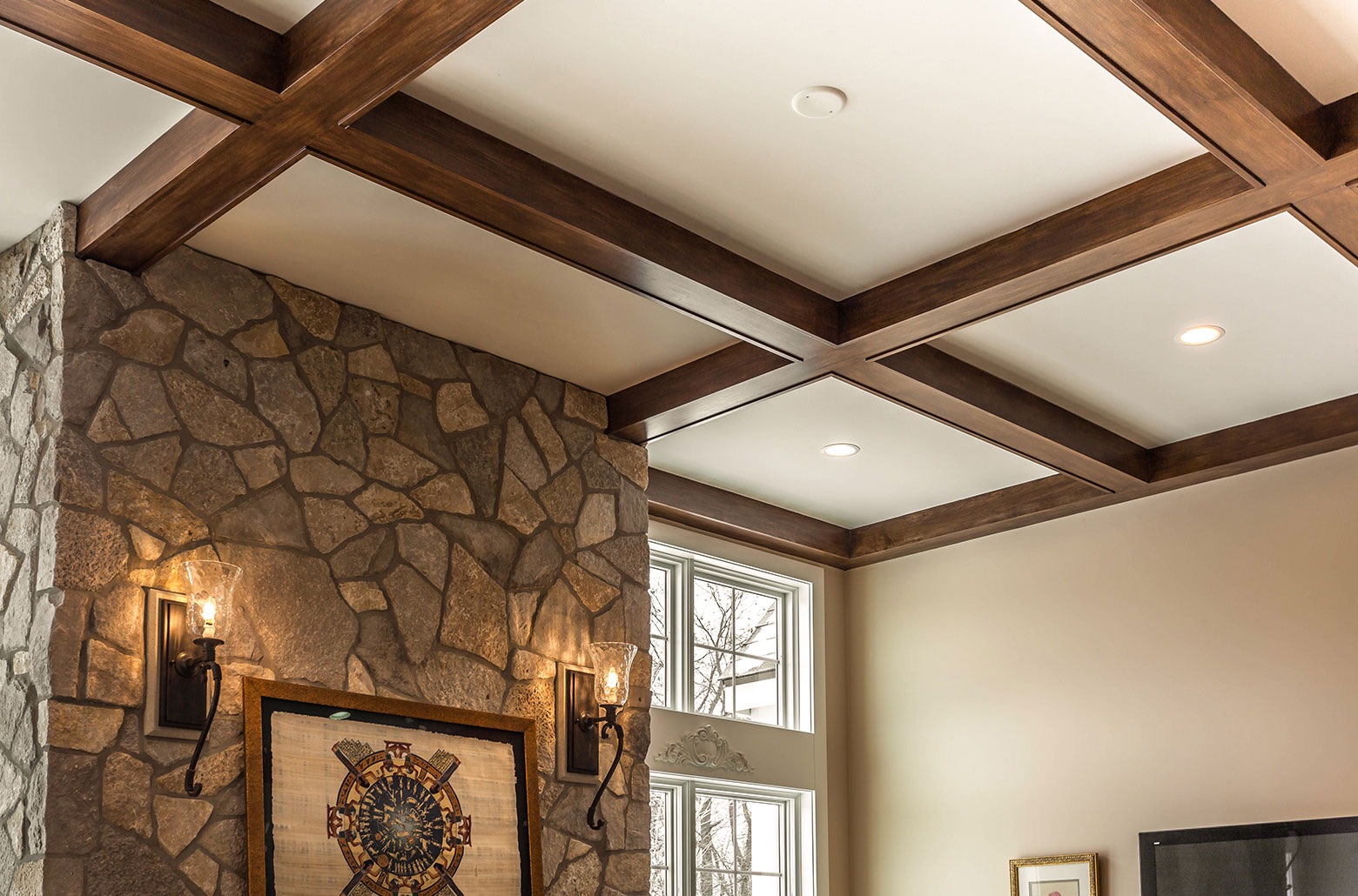 stone fireplace wood ceiling beams